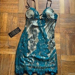 BEBE dress size 6 with tags still on never worn